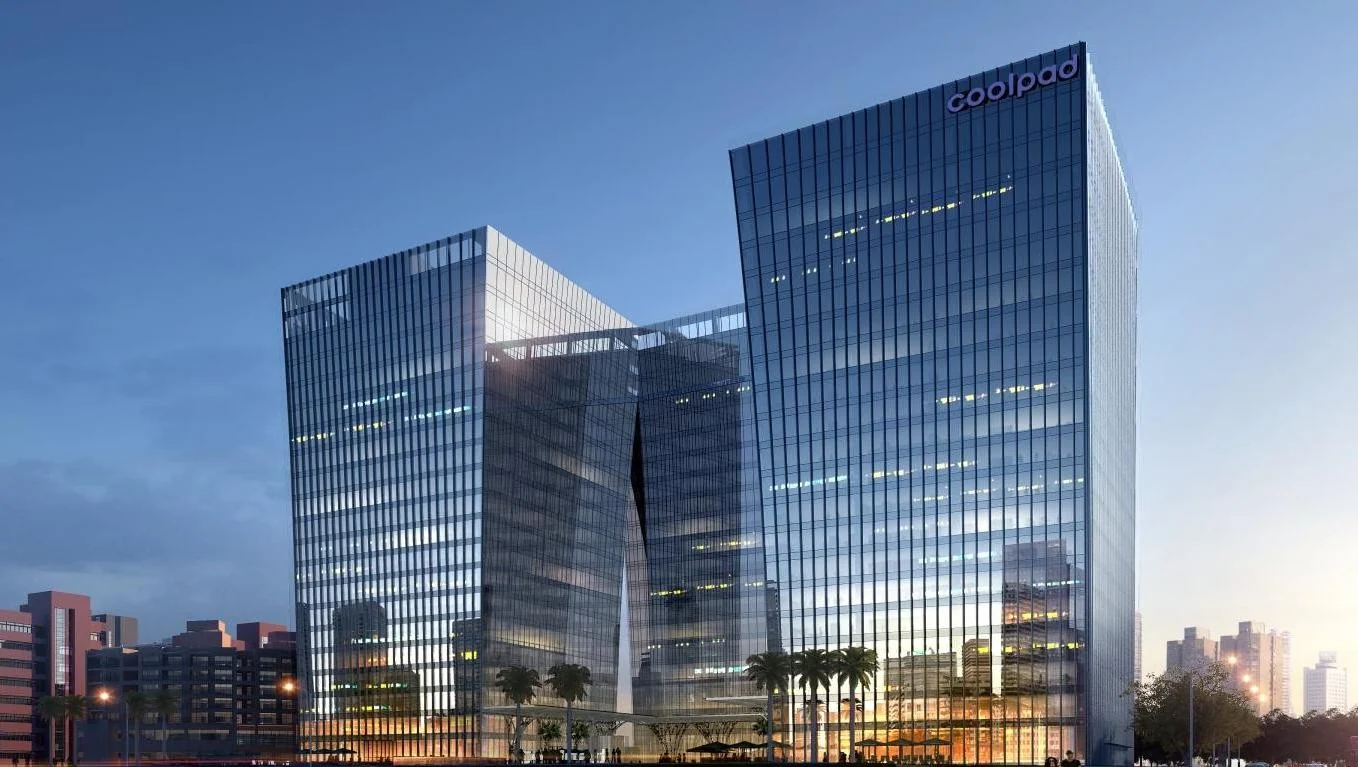 酷派大厦傍晚建筑全景，楼顶可见 Coolpad 标识